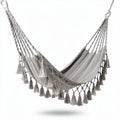 Gray woven hammock with decorative tassels for indoor or outdoor use